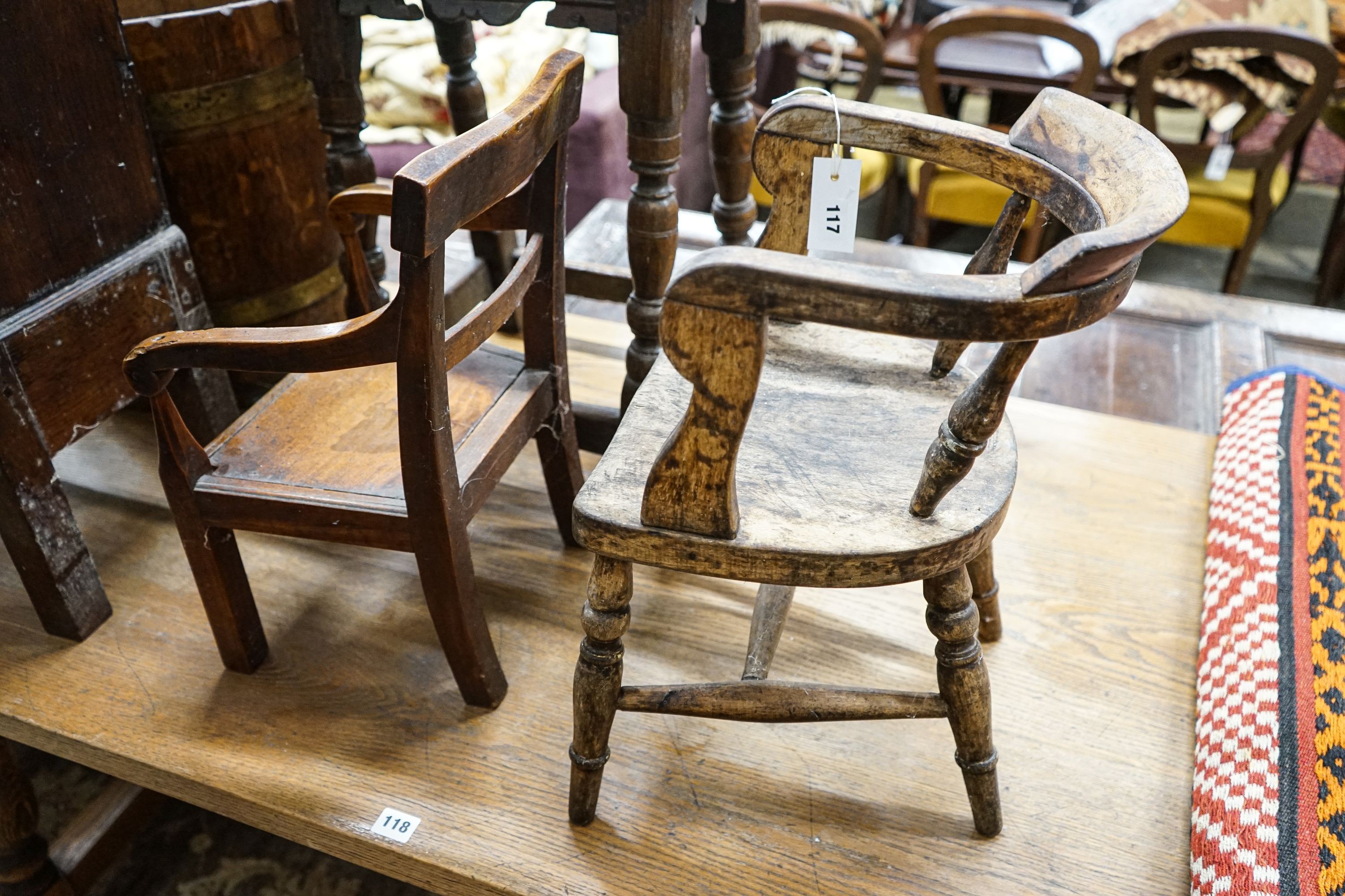 A 19th century fruitwood child's chair, larger width 30cm, height 48cm and a child's primitive tub chair